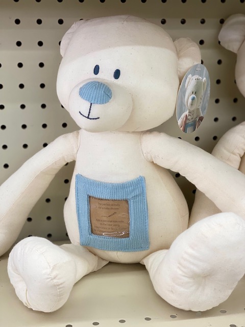 A stuffed teddy bear toy.